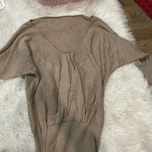 Beige sweater with low back